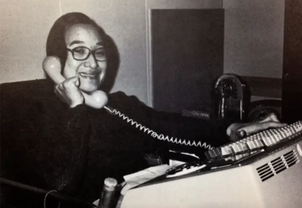 Black and white old photo - woman on phone